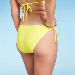 Women's Side-Tie Cheeky Bikini Bottom - Wild Fable™ Yellow -Trendy Women GUEST d60575f0 7377 464a 8b1f bea4ae4f1fb7